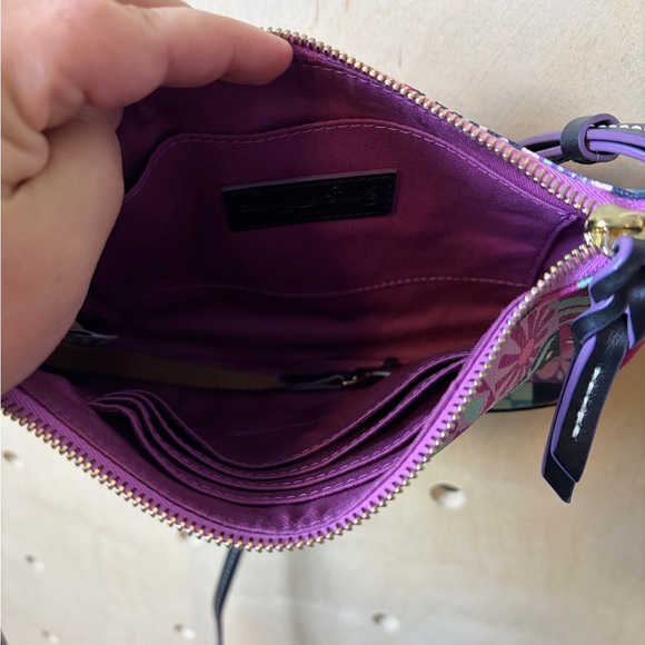 Authentic DisneyParks "It's a Small World" Crossbody; Dooney & Bourke - Picture 6 of 7